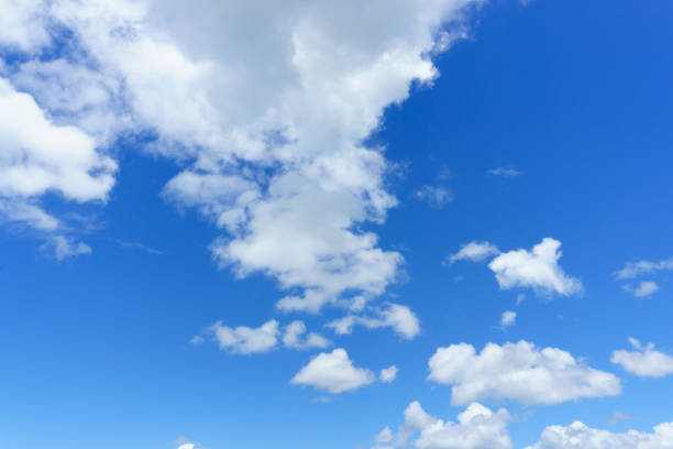 istock blue sky with clouds background. nice cloud formation over the clear sky. Beautiful and Amazing azure sky with clouds and sunshine for background 952058856