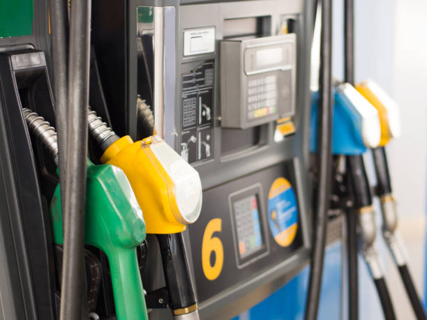 istock pump in vehicle fuel station 952059176