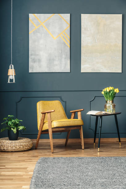 istock Armchair between plant and table 952059216