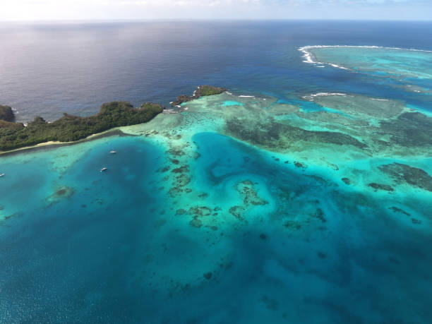 Aerial view of Kenutu Island and coral reef Tonga stock photo
