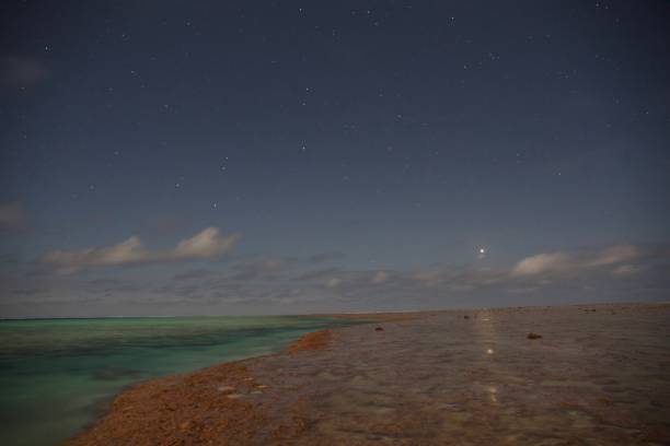 Starry night at Minerva Reef in the Pacific Ocean stock photo