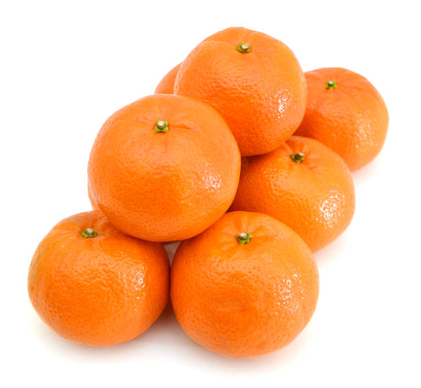 istock Mandarin isolated on white background, pyramid of mandarins on white background, stack of mandarins. 952061040