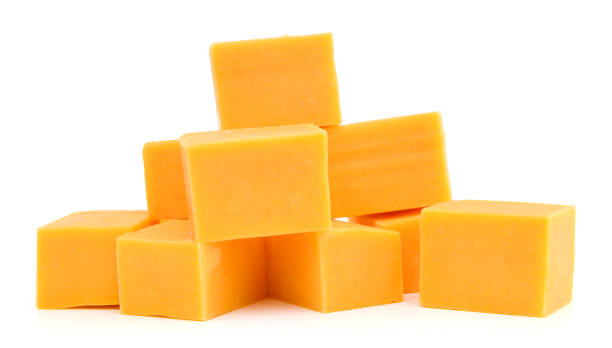 istock piece of cheese isolated on a white background 952063082
