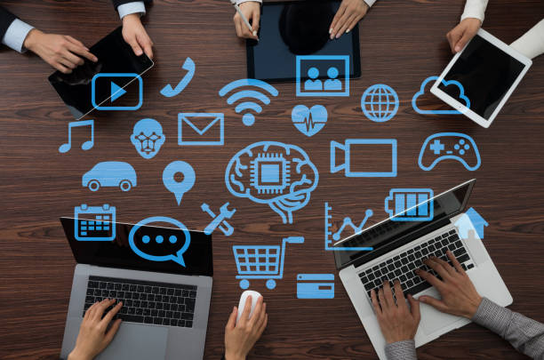 modern marketing team collaborating with AI visual tools showing multiple screens with colorful design interfaces