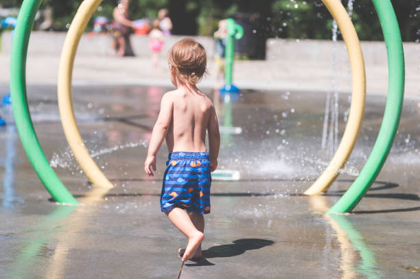 istock Summer afternoon at the splash pad 952064288