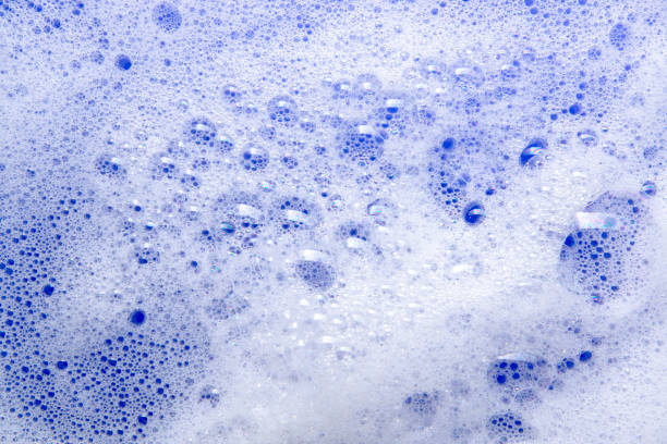istock macro close up of soap foam bubble on blue  background 952071146