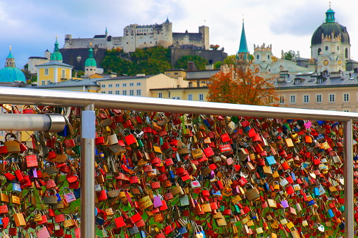 Salzburg cityscape from Makartsteg bridge with romantic padlocks, austria