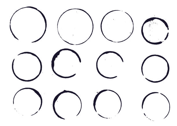 Set of black round stains and blots Set of black round stains and blots on white background. Vector illustration. Elemens for design."n ring stock illustrations