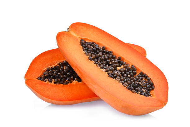 istock half of ripe papaya fruit with seeds isolated on white background 952076120