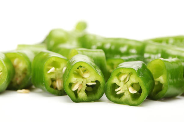 istock Serrano Chili Peppers on White Background 952081478