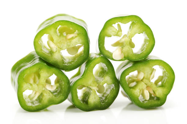 istock Serrano Chili Peppers on White Background 952081538