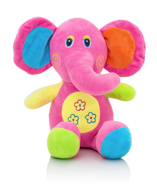 istock Elephant plushie doll isolated on white background with shadow reflection. Elephant plush stuffed puppet on white backdrop. Jumbo plushie toy. Rainbow colored stuffed elephant toy. Pinky elephant. 952081714