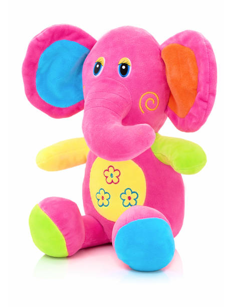 istock Elephant plushie doll isolated on white background with shadow reflection. Elephant plush stuffed puppet on white backdrop. Jumbo plushie toy. Rainbow colored stuffed elephant toy. Pinky elephant. 952081758