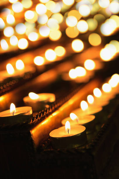 istock Burning candles in the dark 952081824