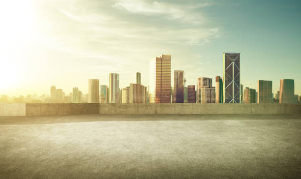 istock Empty asphalt carpark with modern city skyline 952082512