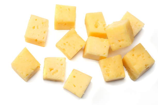 istock piece of cheese isolated on white background. top view 952084150