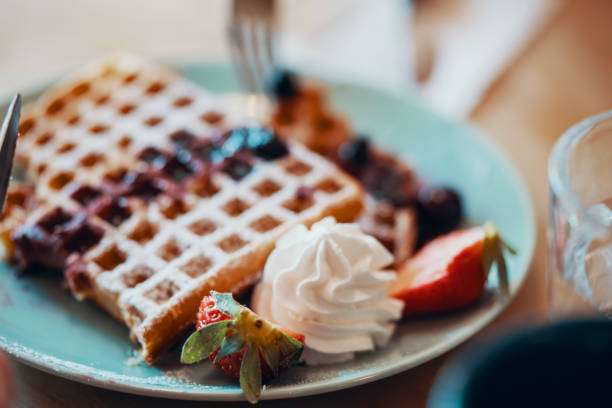 istock Plate of partially eaten waffles 952084654