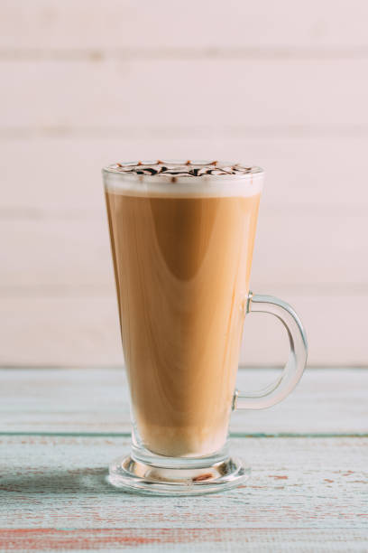 istock Tall Glass Latte on Wooden Background 952086870