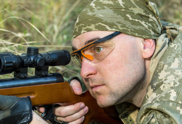 istock young man with an air rifle 952089500