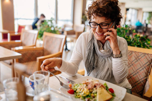 istock Woman at a restaurant 952090780