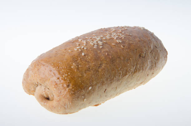 istock bread, homemade whole wheat bread on a white background 952093072