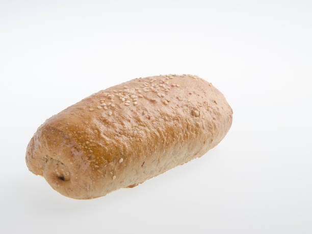istock bread, homemade whole wheat bread on a white background 952093110