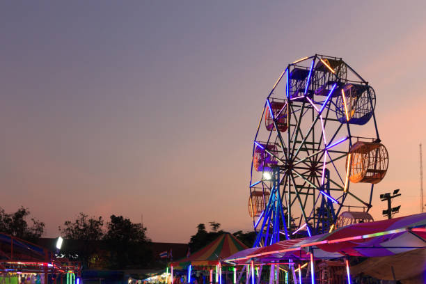 istock Ferris wheel at night sky background 952097970