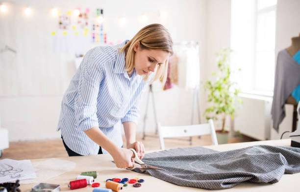 istock Young creative woman in a studio, startup business. 952109344