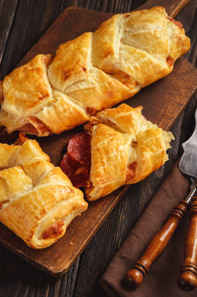 istock Puff pastry bread with salami and mozzarella. 952111670