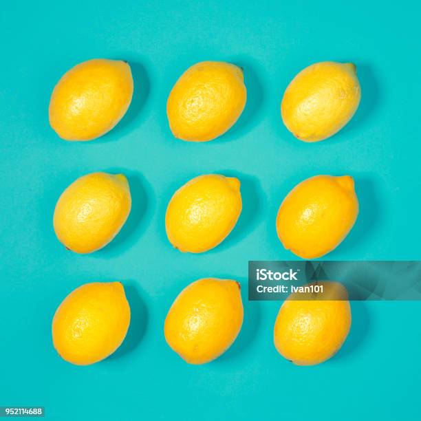 Lemon Pattern On Pastel Blue Background Minimal Summer Concept Flat Lay Stock Photo - Download Image Now