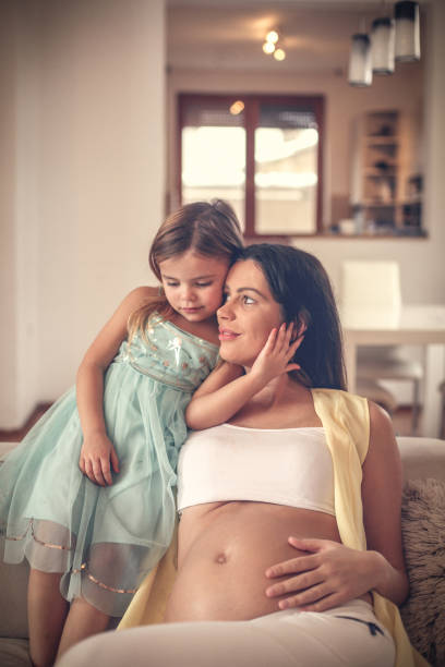 istock Mommy and me sharing tender with our future belly . 952116352