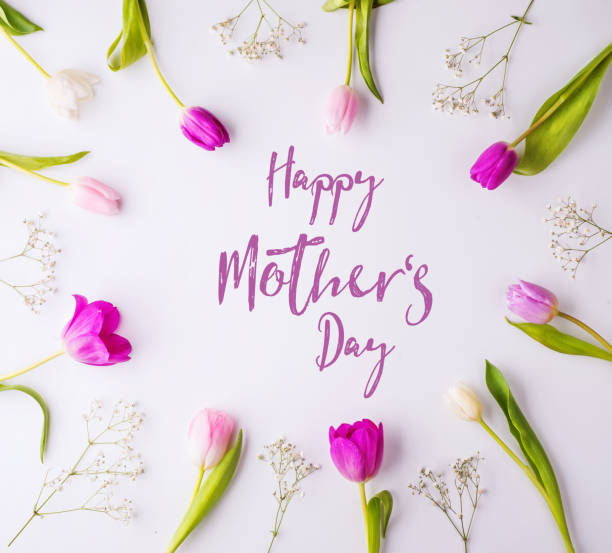 istock Happy mothers day composition. Flowers on white background. Studio shot. 952117376