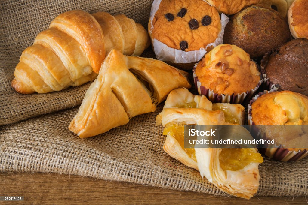 Bakery products Bakery products on wooden table Baked Pastry Item Stock Photo