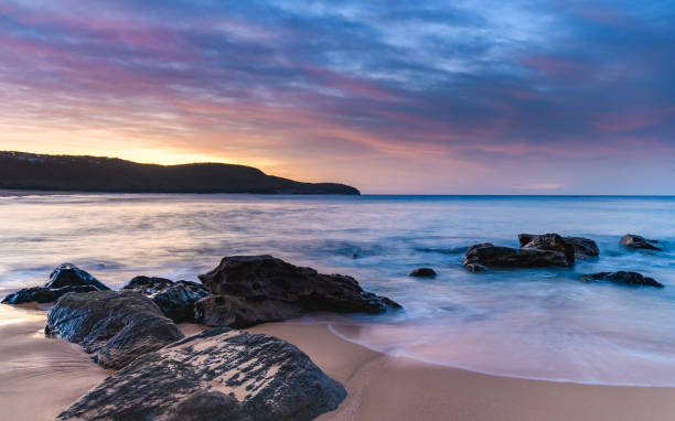 istock Soft Rocky Sunrise Seascape 952118310