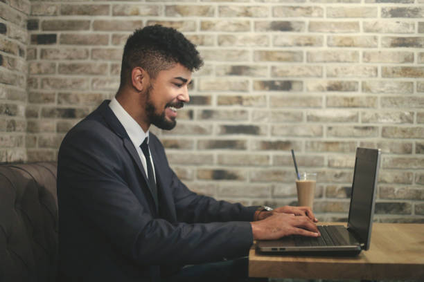 istock African businessman working on laptop 952119780