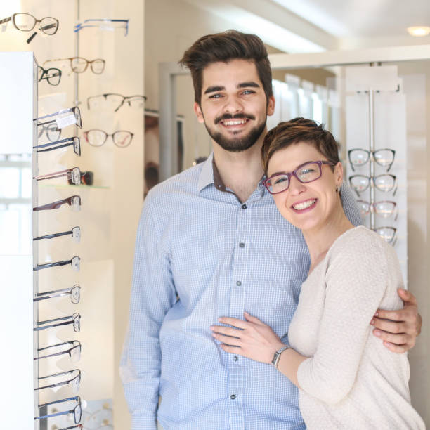 istock Couple in a eyewear store 952120482