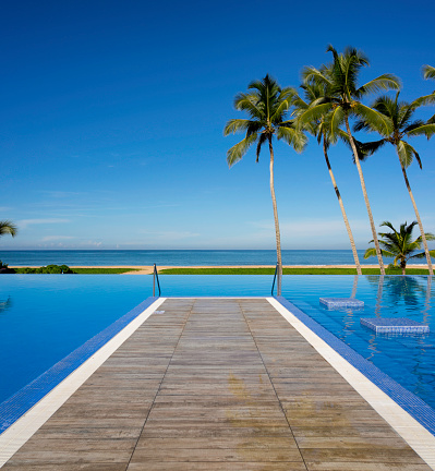 A beautiful infinity pool in an idyllic tropical location