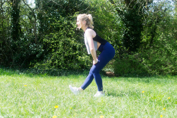 istock Young woman stretching after a run 952125268