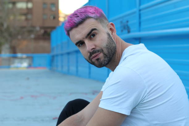 istock Handsome pink haired young man outdoors 952132168