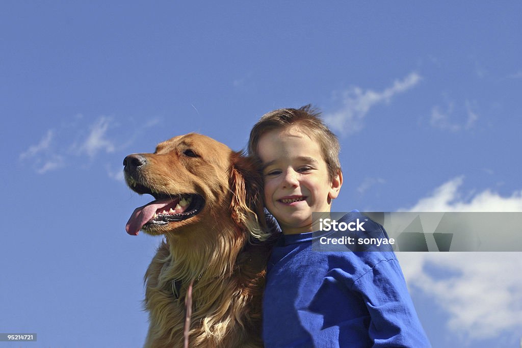 Boy and Dog  American Culture Stock Photo