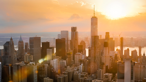 Aerial shot of the Lower Manhattan in setting sun. Shot in NYC, USA.