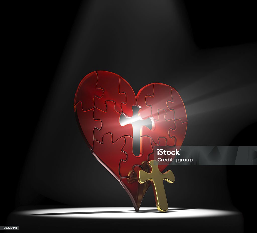 Heart shaped puzzle with a cross removed from the center Red heart puzzle with a gold cross as the missing center piece under a spotlight on a dark background Cross Shape Stock Photo