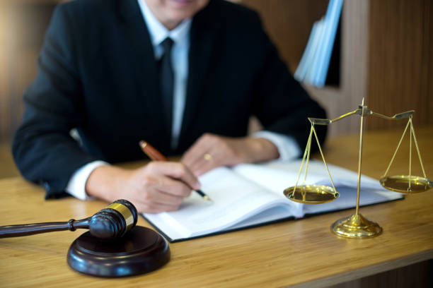 istock lawyer or  judge work in the office with gavel 952304880