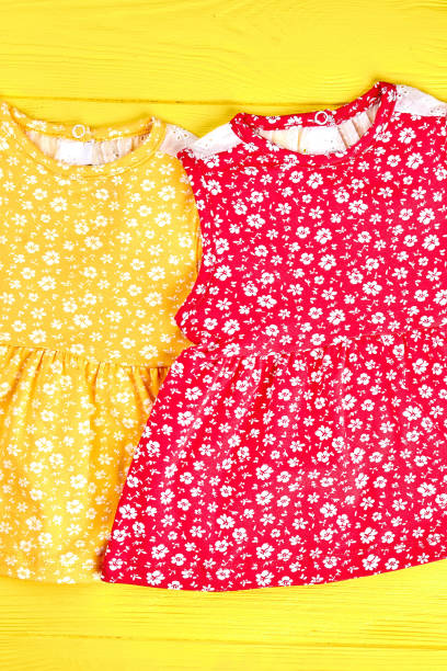 istock Set of babies brand dresses. 952308056