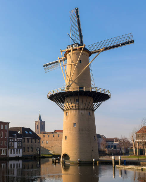 istock Typical Dutch tall windmill The Camel in front of a blue sky, The Netherlands 952308652
