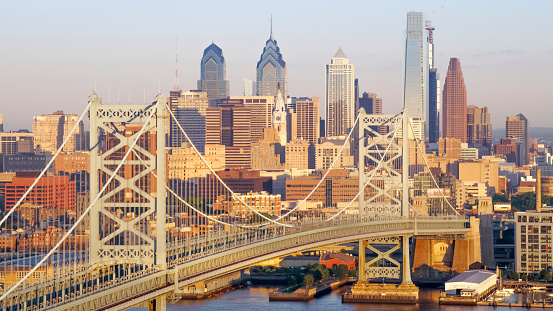 Aerial shot of the Benjamin Franklin Bridge with City of Philadelphia on a sunny day. Shot in PA, USA.