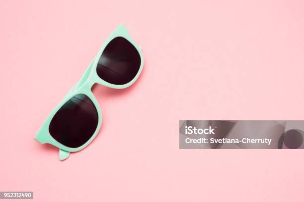 Green Pastel Sunglasses Isolated On Punchy Pink Top View Copy Space Summer Concept Stock Photo - Download Image Now