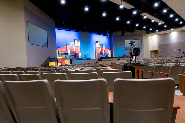 Church with Blue Lit Stage place of worship stock pictures, royalty-free photos & images