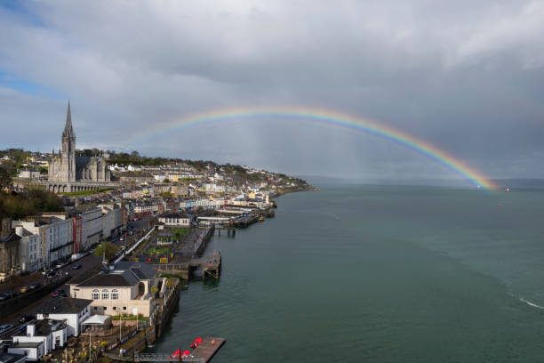 rainbow w: st. colman's cathedral in cobh, ireland - rainbow harbor zdjęcia i obrazy z banku zdjęć