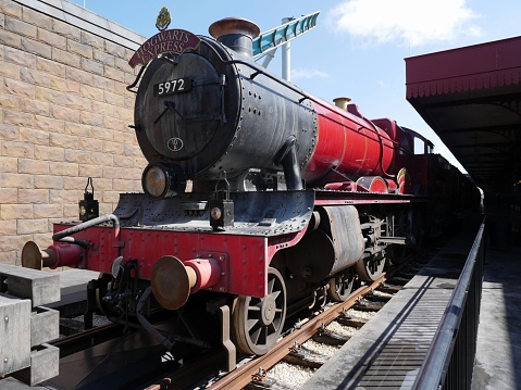 ORLANDO, FLORIDA—Photo of the Hogwarts Express at the Universal Studios in Orlando, Florida taken in September 2015. A ride in this train is a must-not-miss chance when visiting Orlando.